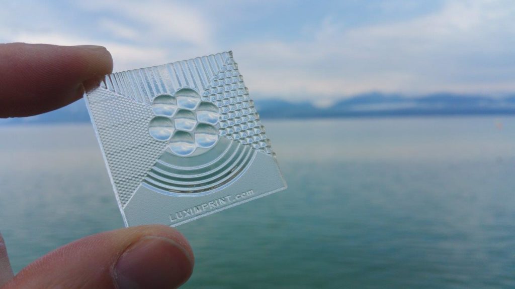 Image of handheld sample of printed optics by Luximprint